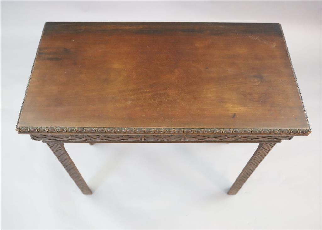 A George III mahogany card table, W.2ft 5in. D.1ft 3in. H.2ft 4in.